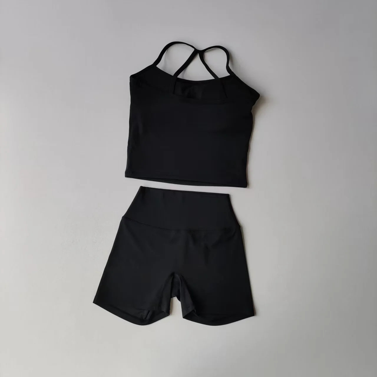 Conjunto Halter Seamless Atravex™ con Shorts Cintura Alta Acanalados – Definición y Soporte en Movimiento