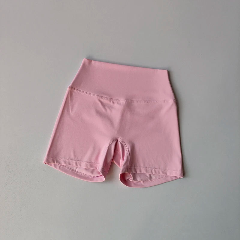 Conjunto Halter Seamless Atravex™ con Shorts Cintura Alta Acanalados – Definición y Soporte en Movimiento