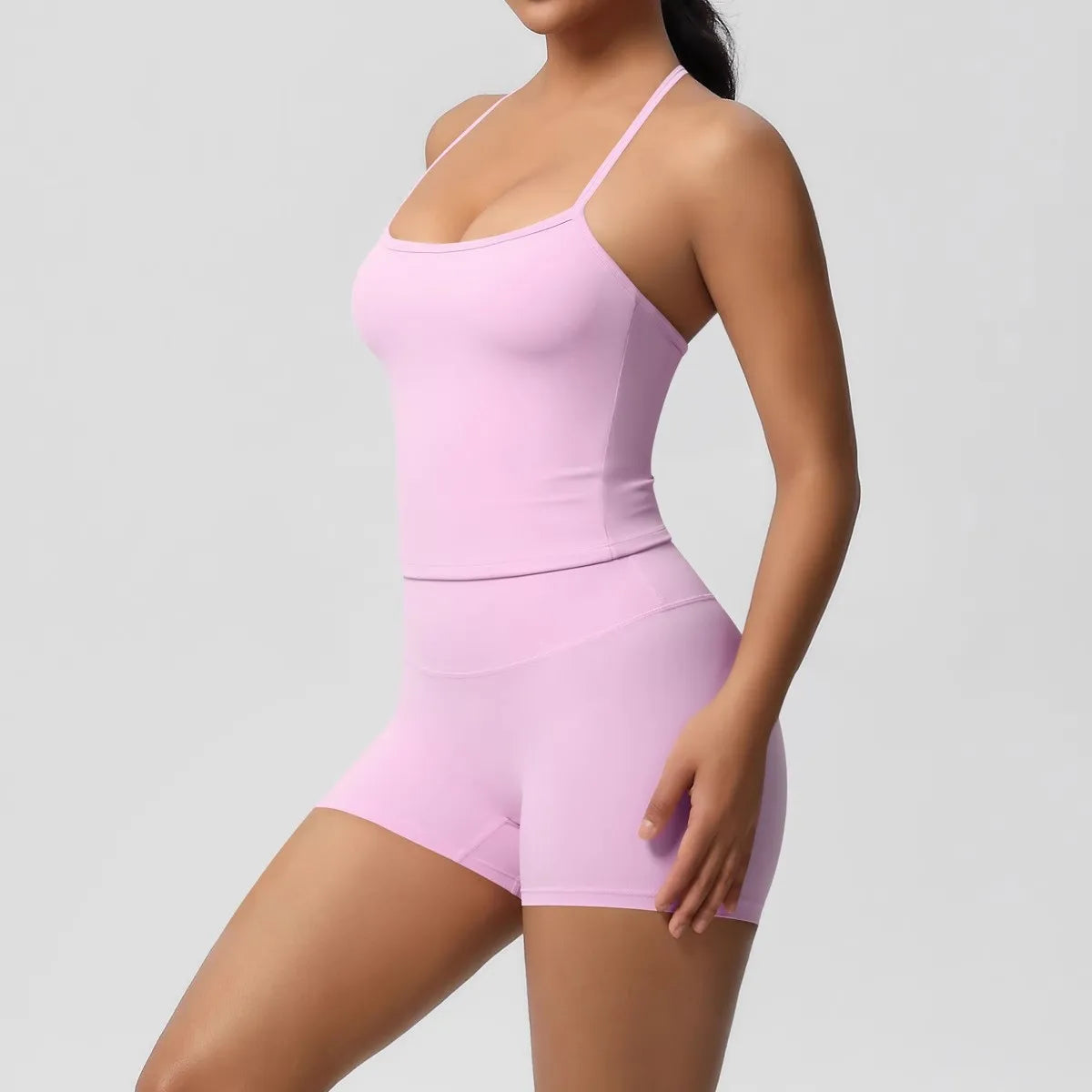Conjunto Halter Seamless Atravex™ con Shorts Cintura Alta Acanalados – Definición y Soporte en Movimiento