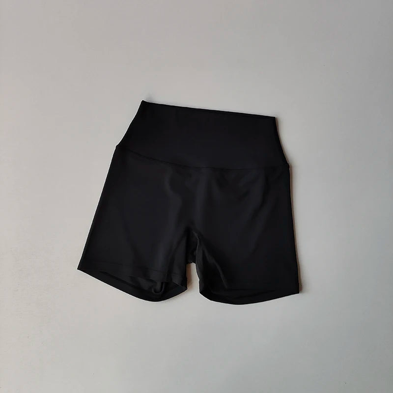 Conjunto Halter Seamless Atravex™ con Shorts Cintura Alta Acanalados – Definición y Soporte en Movimiento